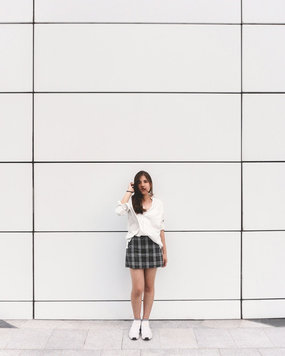 woman wearing black and white garments