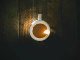 Cozy personalized mug on a wooden table with natural light.