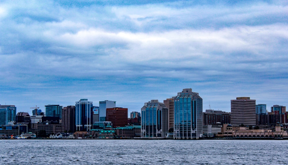 body of water across city buildings