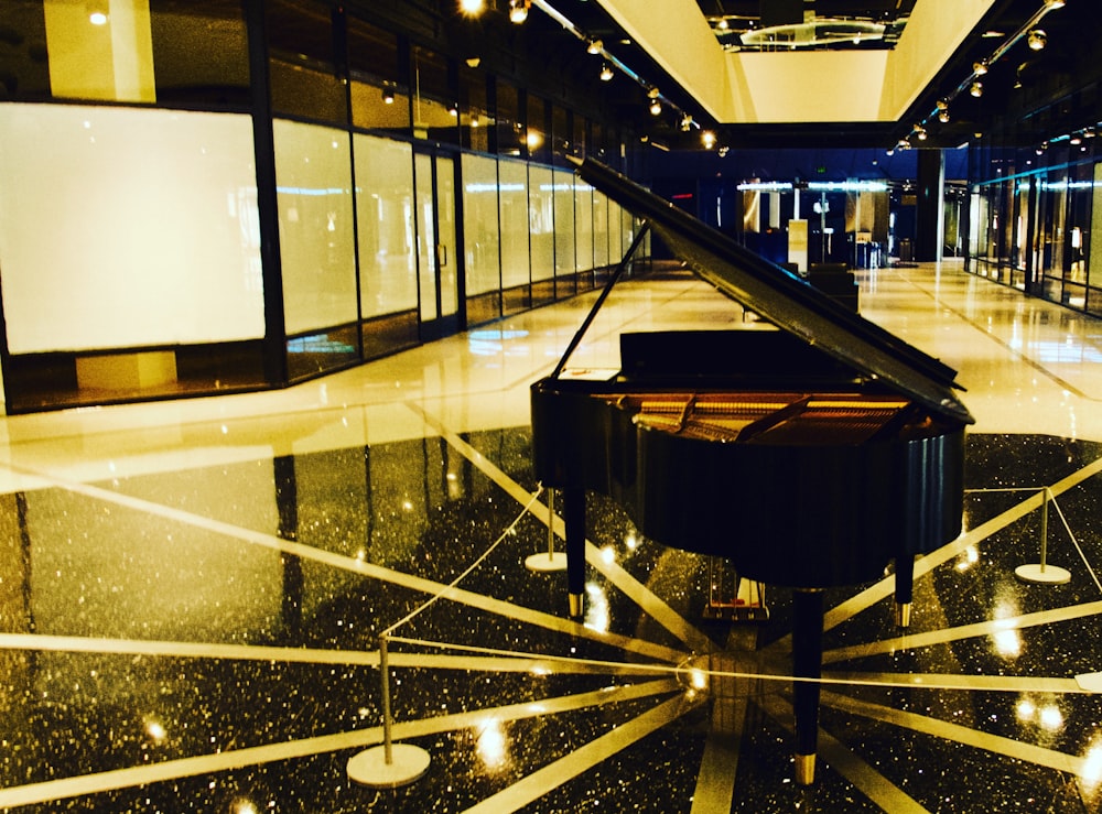 black and brown grand piano