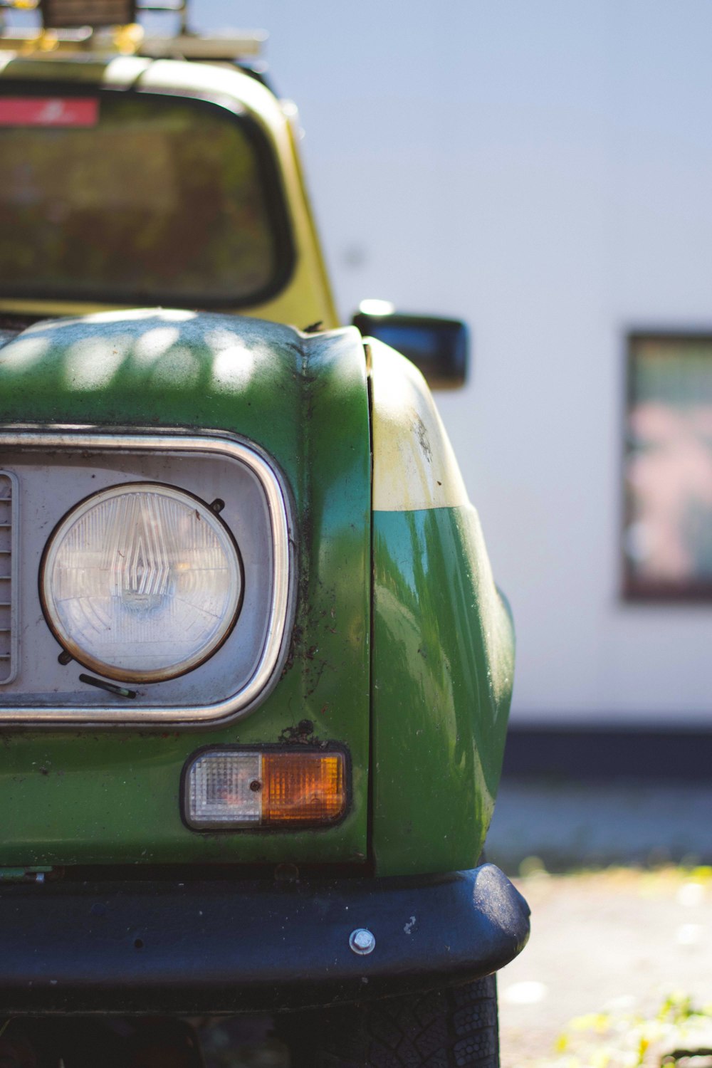 photo of green and white vehicle