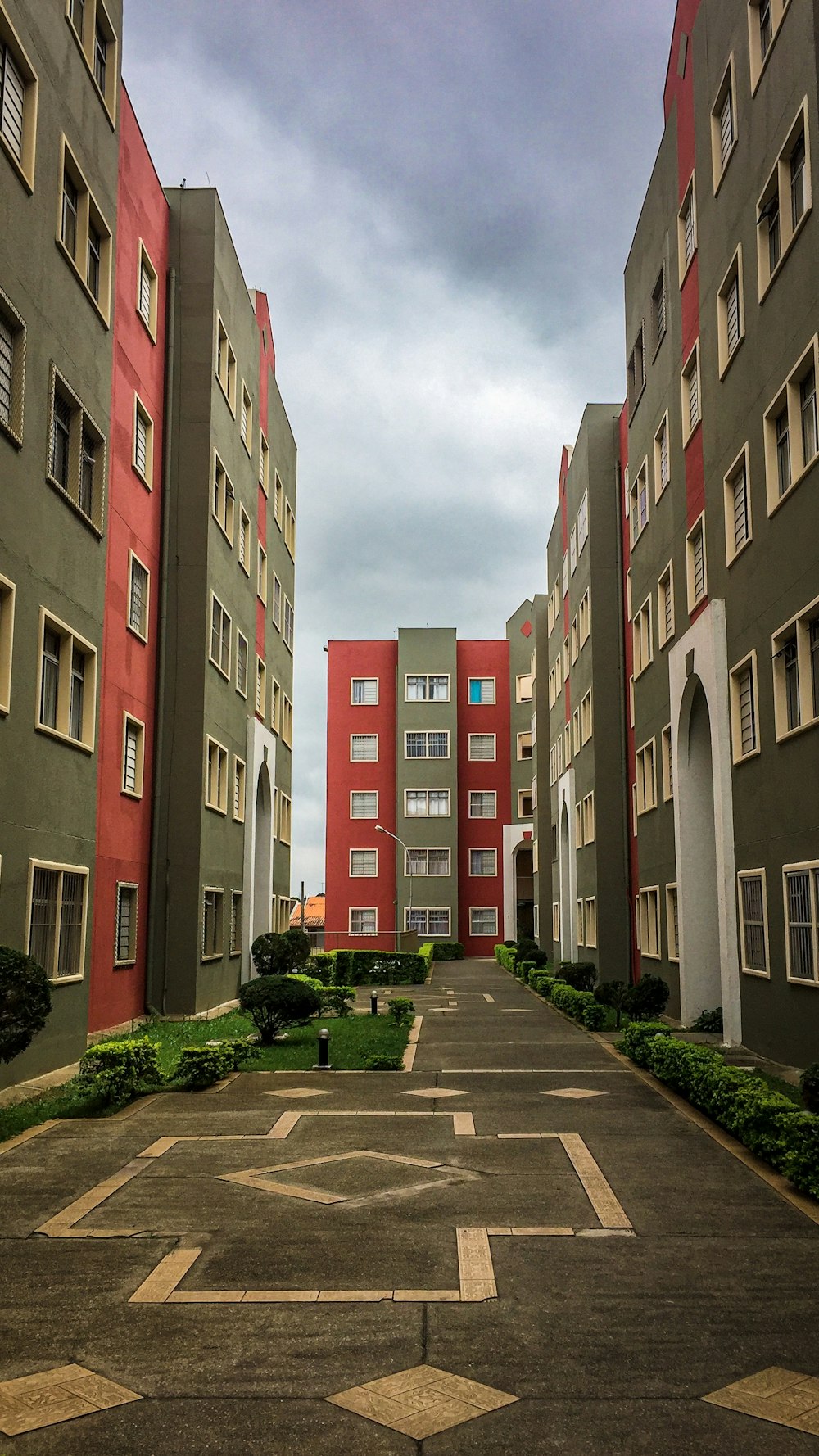 red and gray concrete buildings