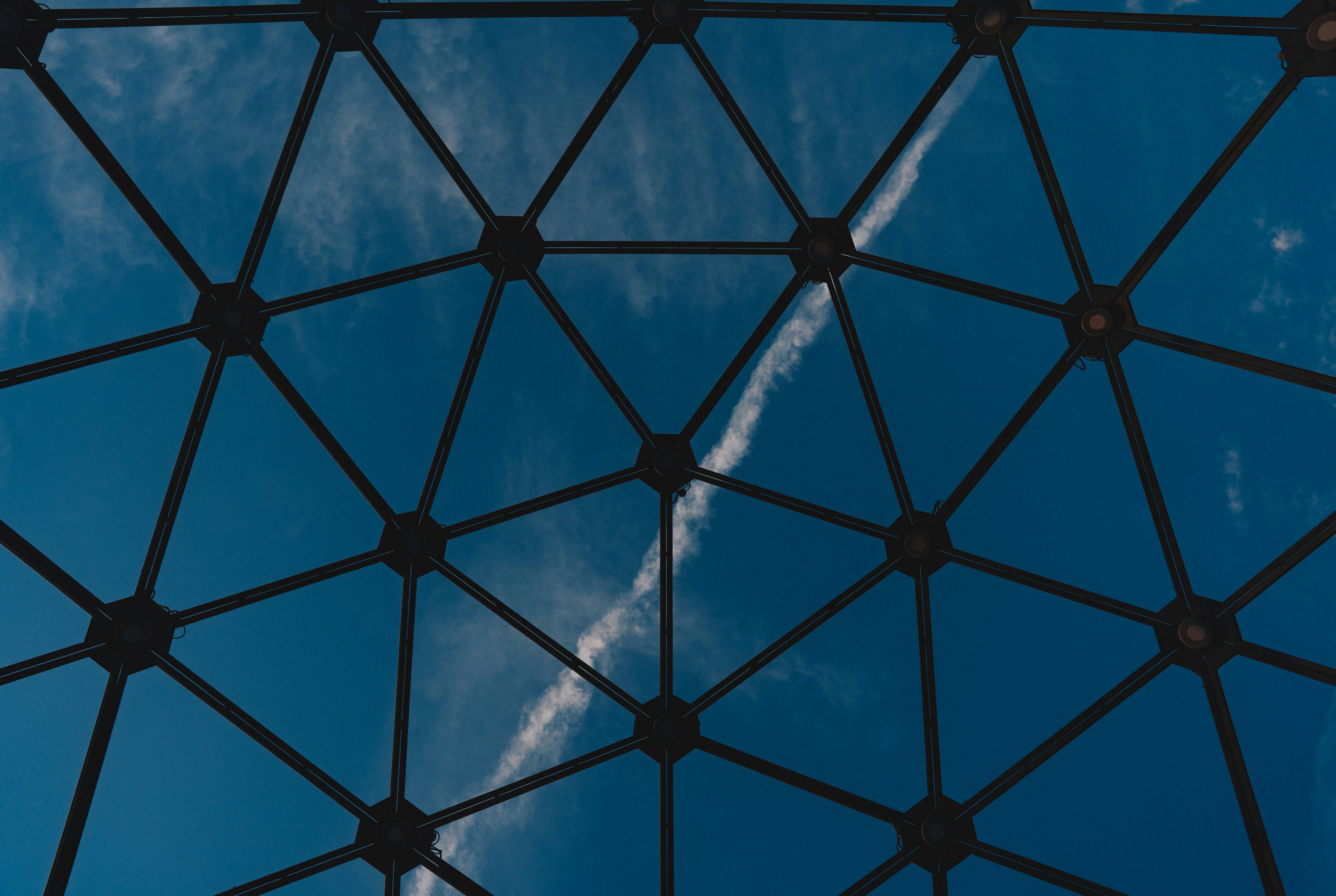 a clear blue sky with some clouds in it