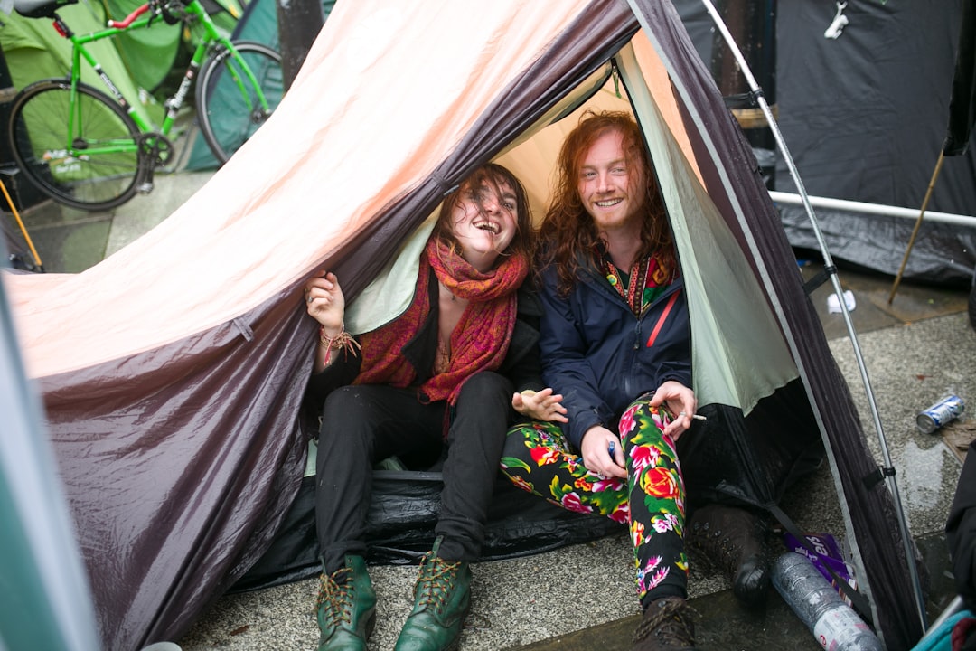 man and woman inside tent