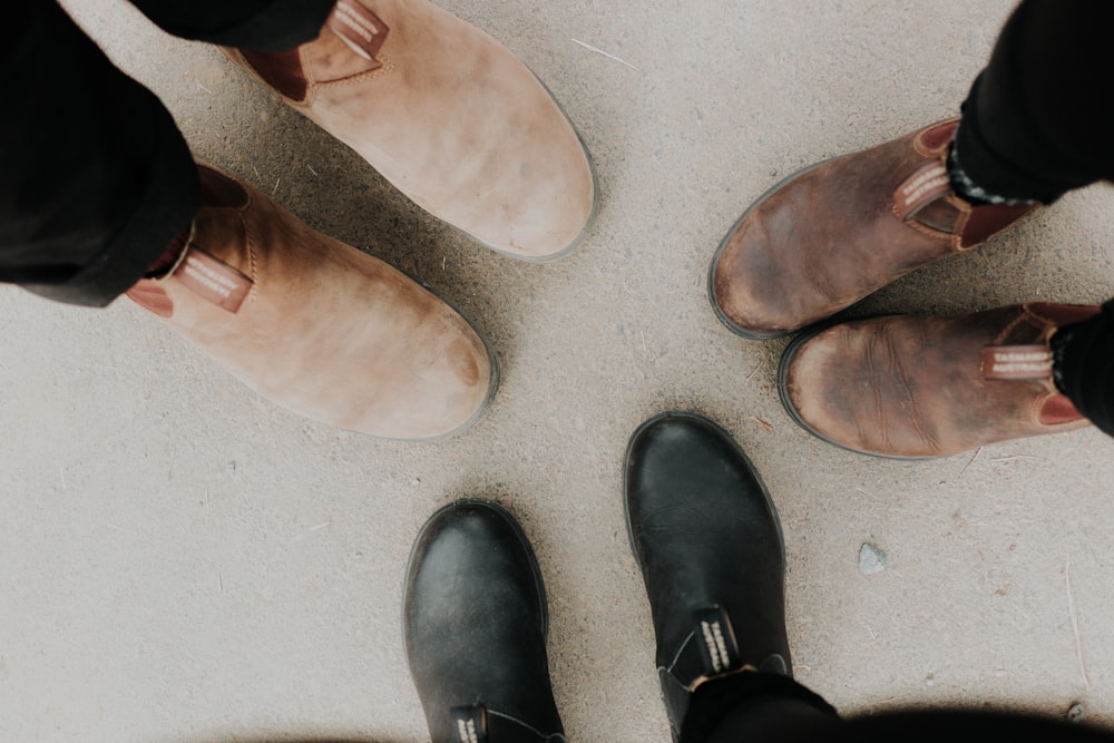 three pair of leather shoes