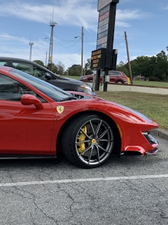 The ABS Driving car parked outside a local landmark in Birmingham with a clear logo visible.