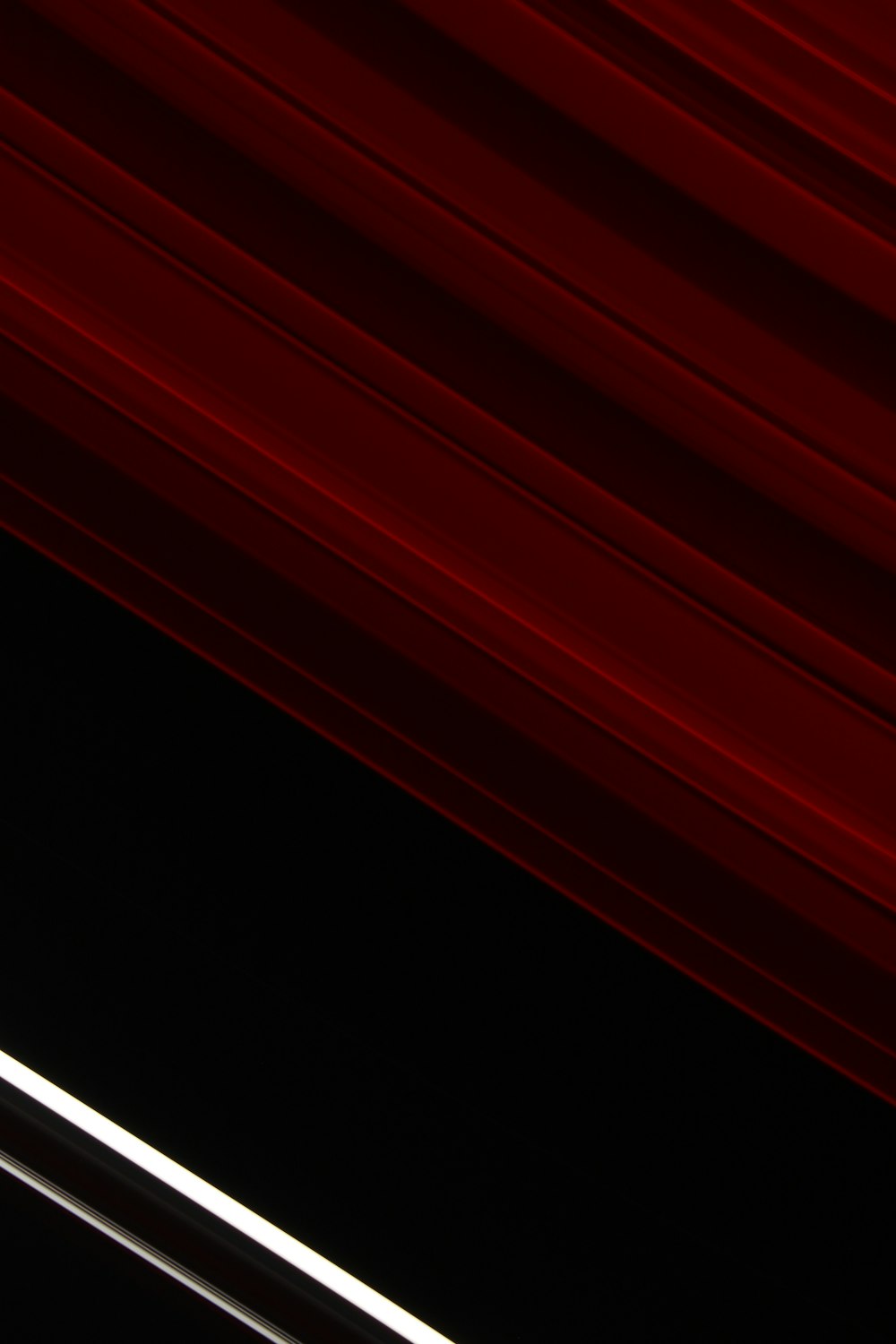 red stripes on a black background