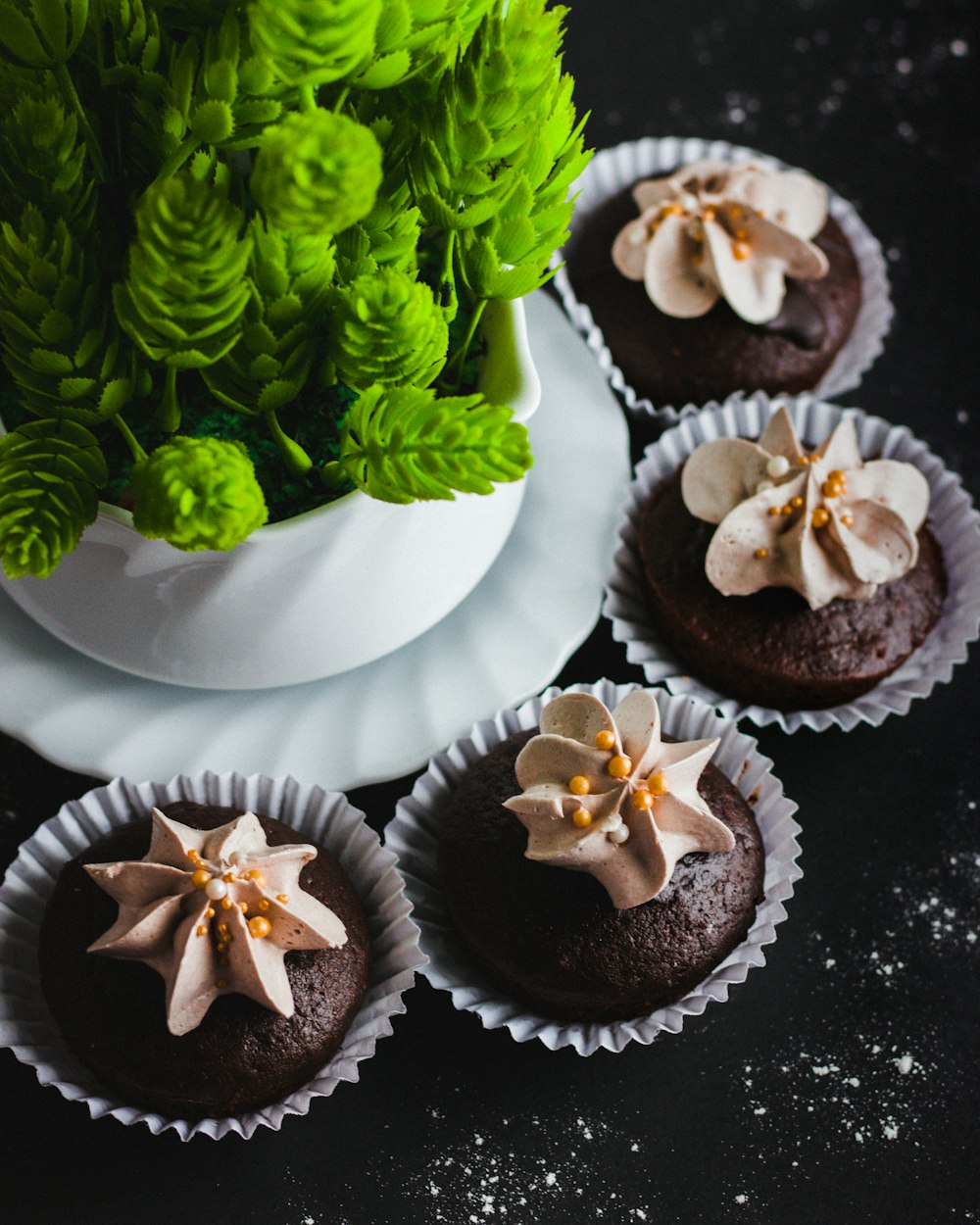 four chocolate cupcakes