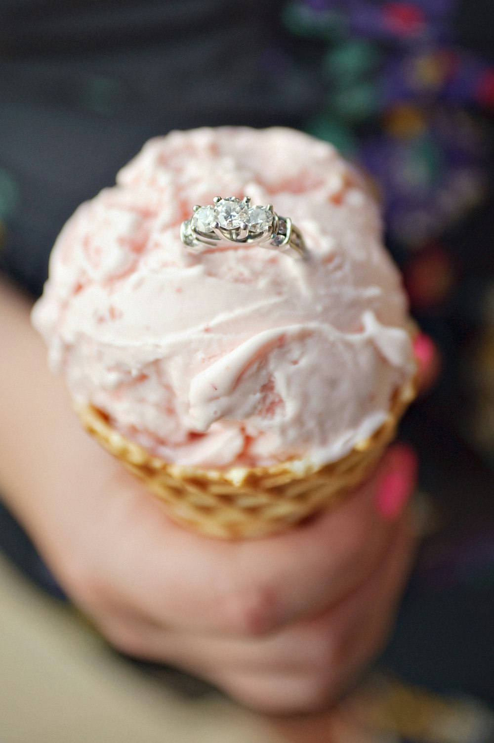 silver-colored ring on ice cream