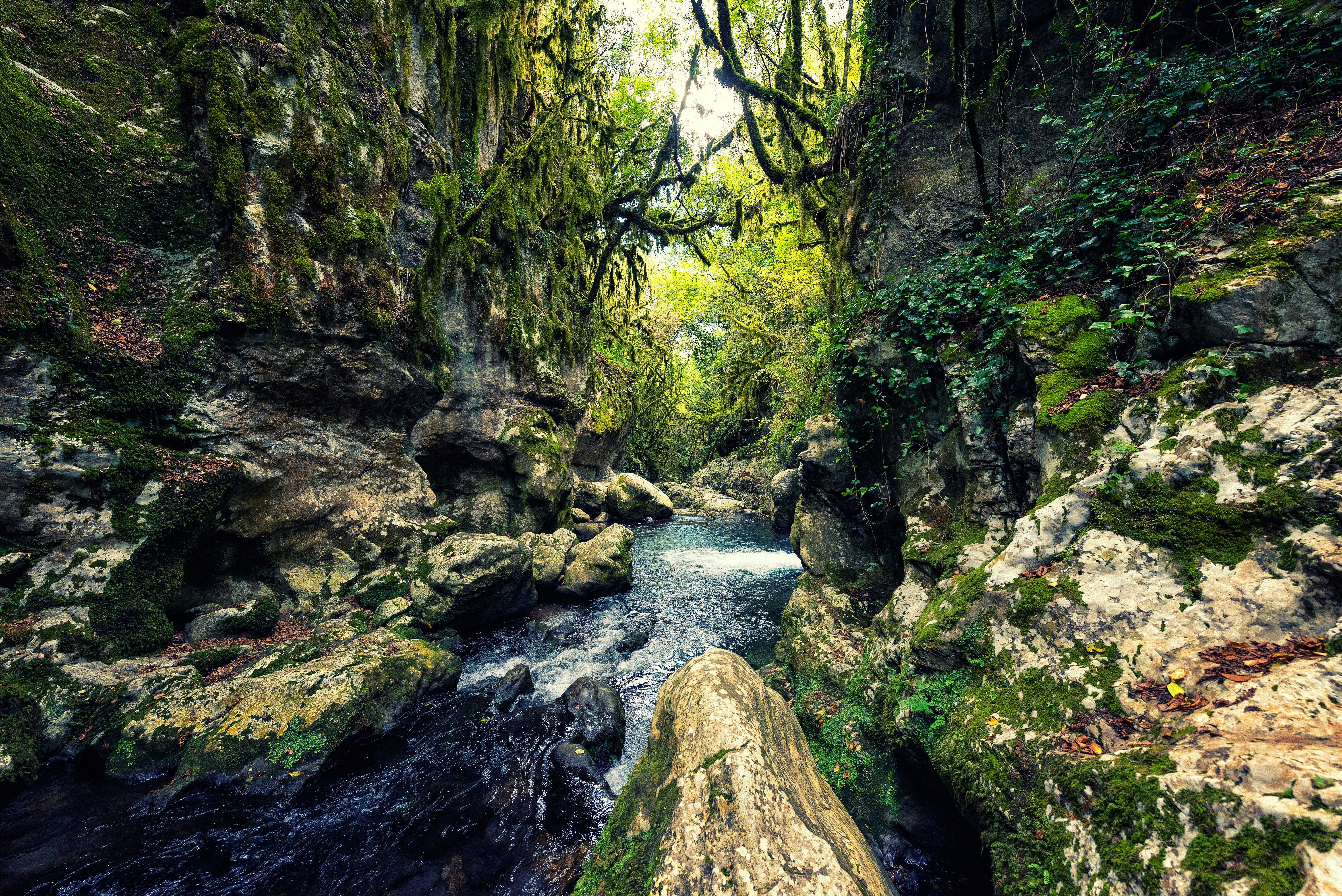 water flowing between rocks
