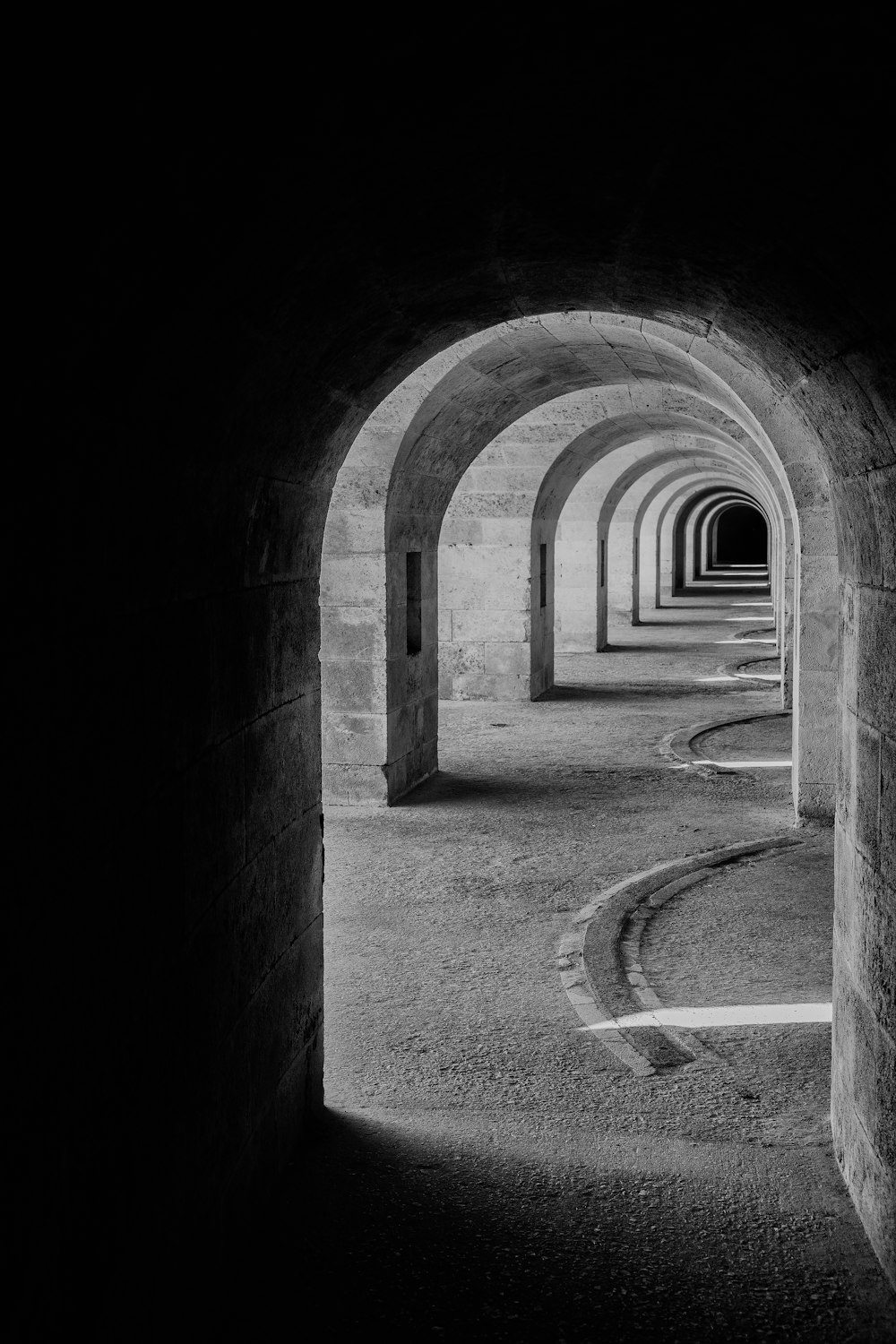 grayscale photo of hallway