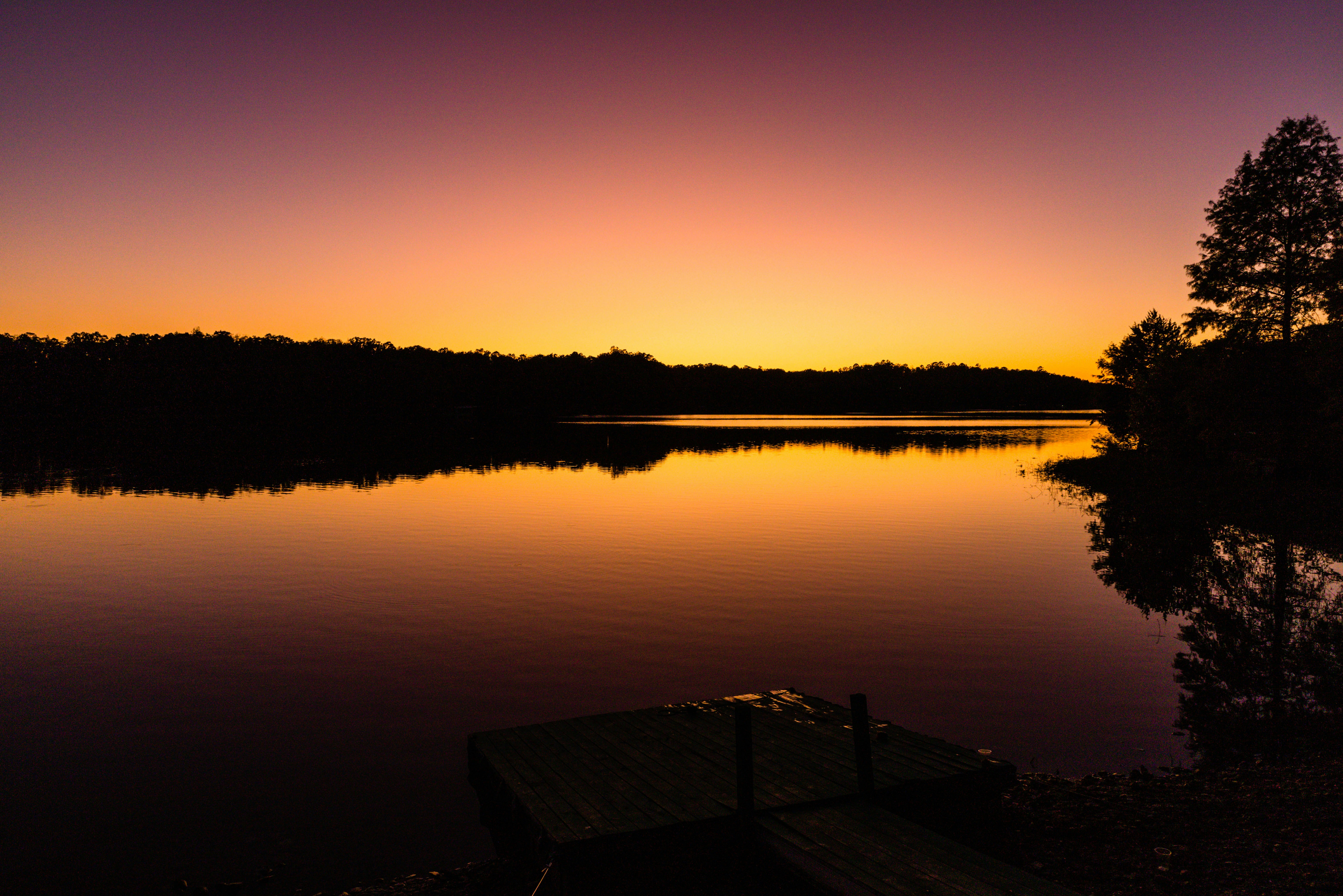 body of water during golden hour