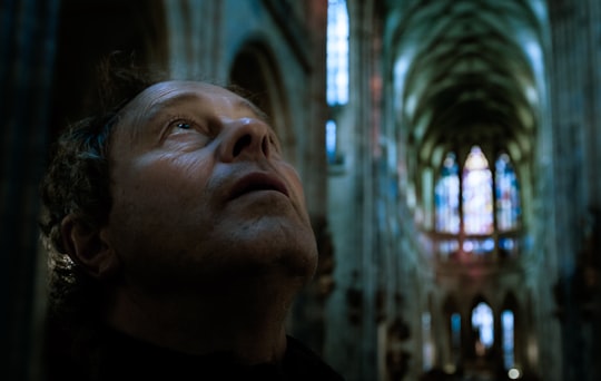 man looking up in Cologne Germany