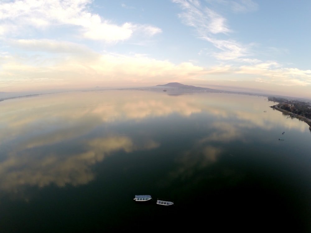 aerial view of sea and two boats