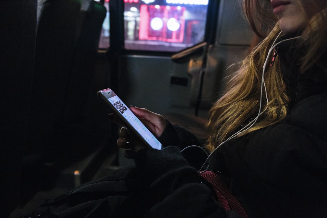 person uses smartphone,