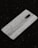 A smartphone with a sleek textured back cover lying on a dark, rough surface. The dual-camera setup is located at the top center. The phone’s design features a minimalist aesthetic.