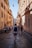 man walking in the middle of the street