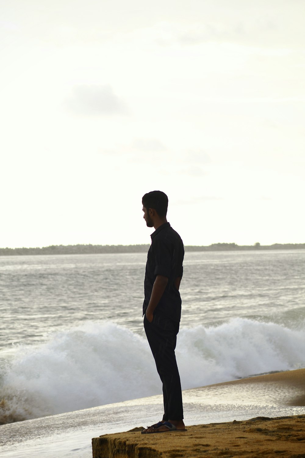 man standing on brown clip