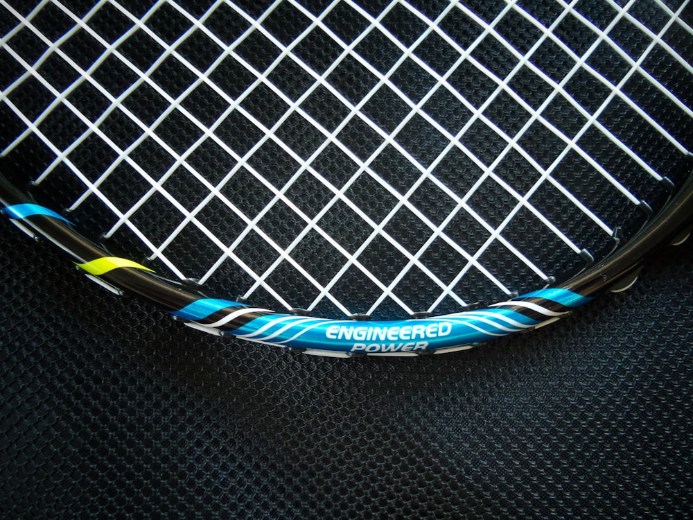 blue and white tennis racket