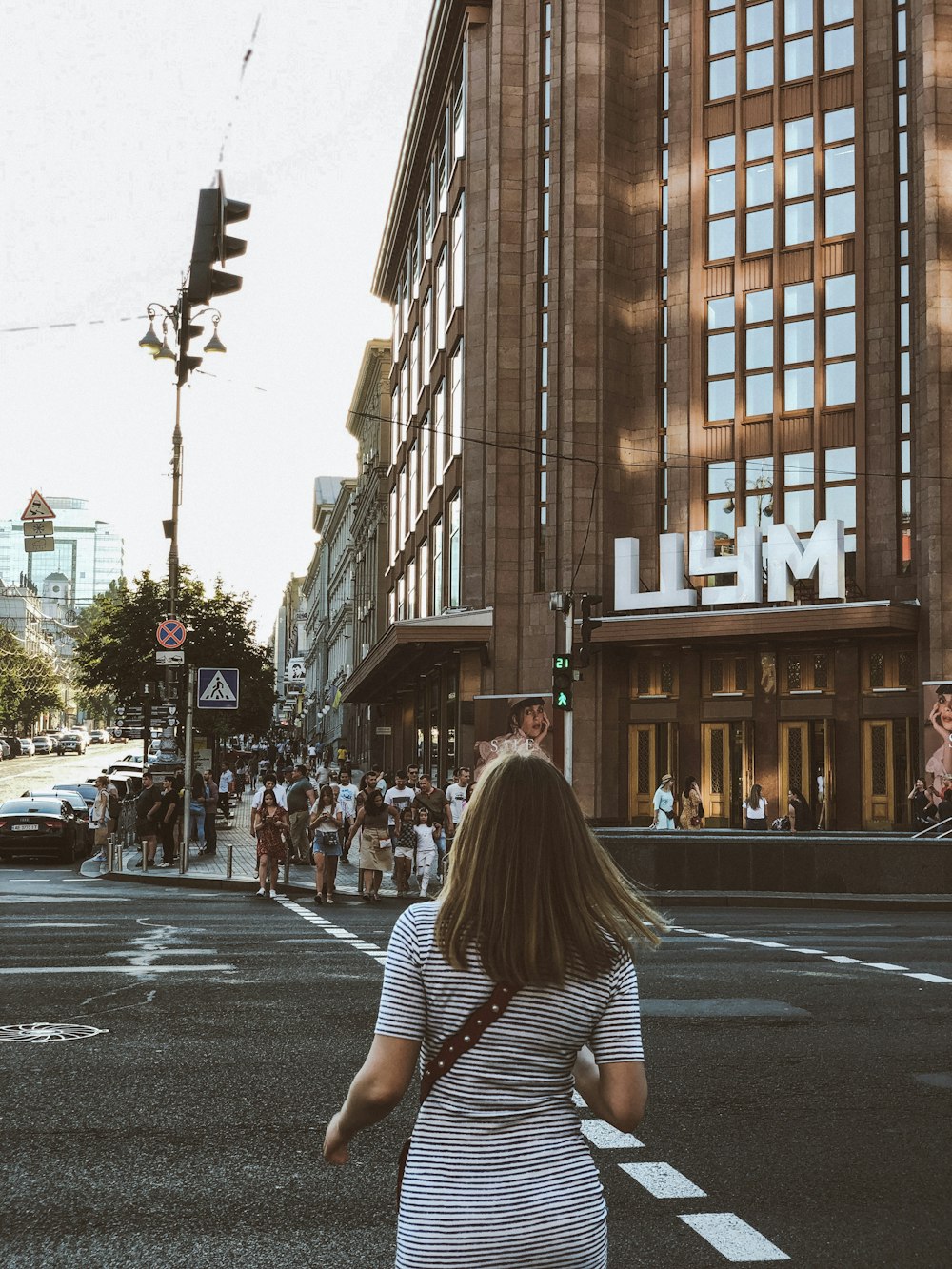 man crossing pedestrian