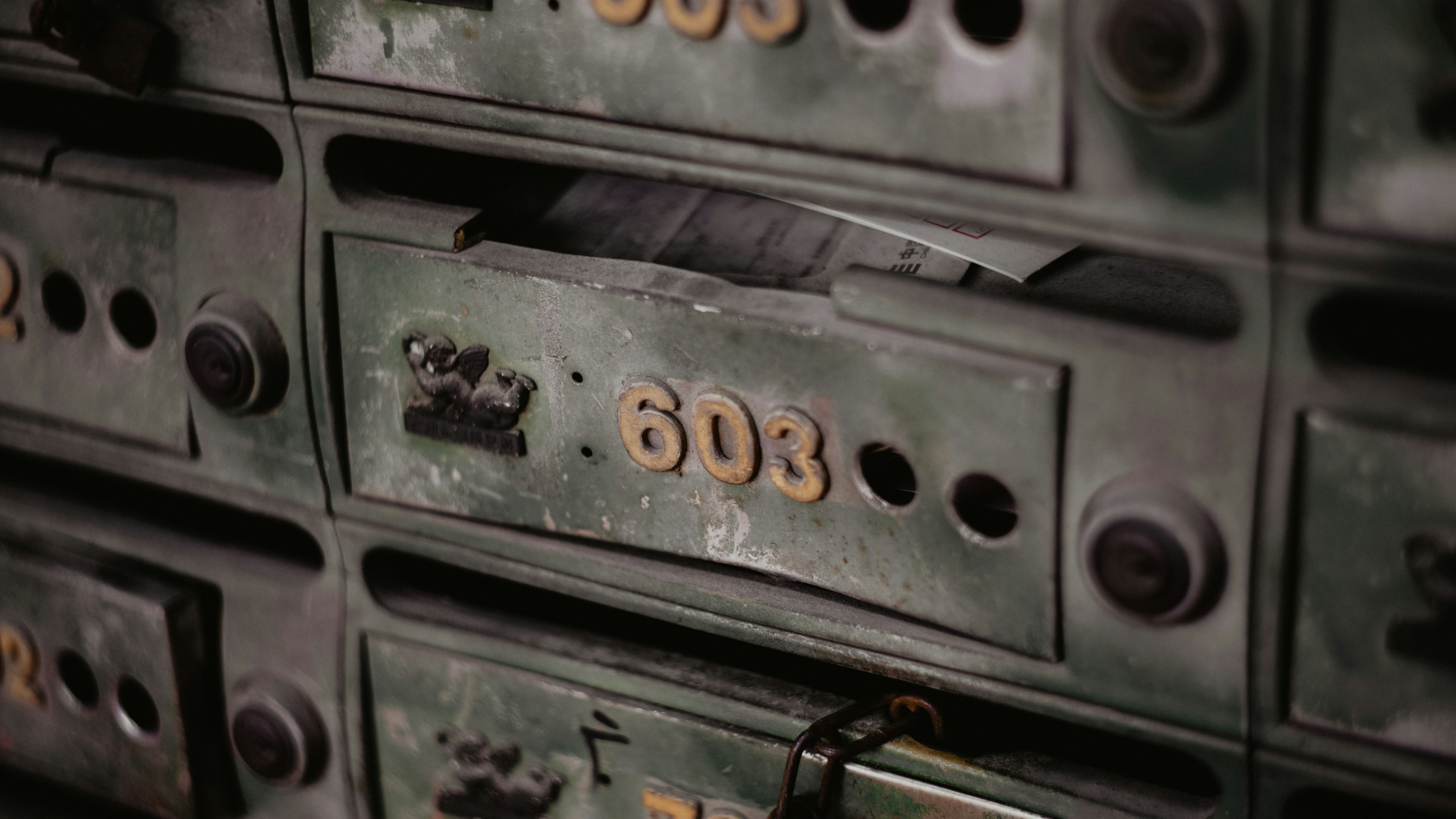 a bunch of metal lockers with numbers on them