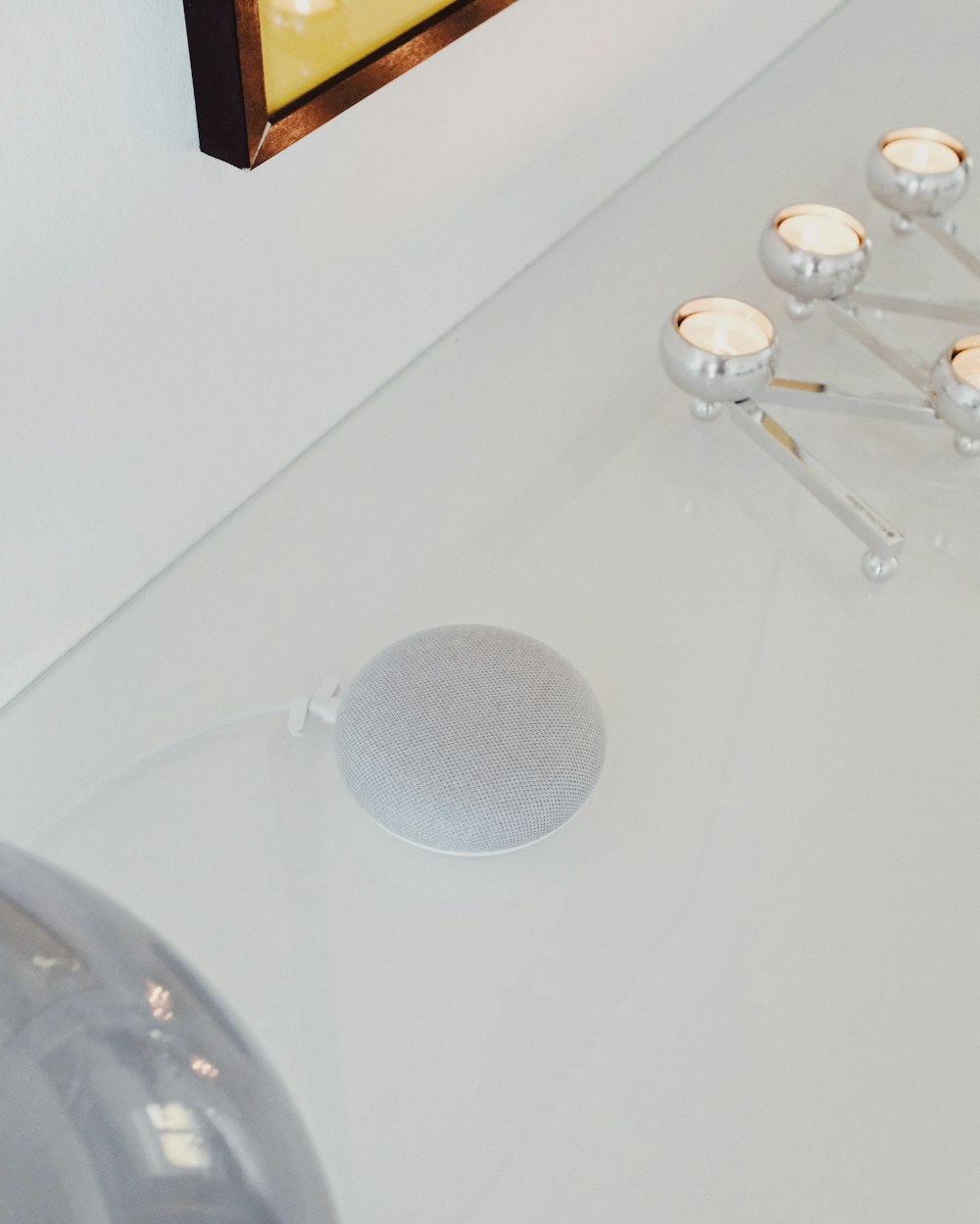 a group of candles sitting on top of a white table