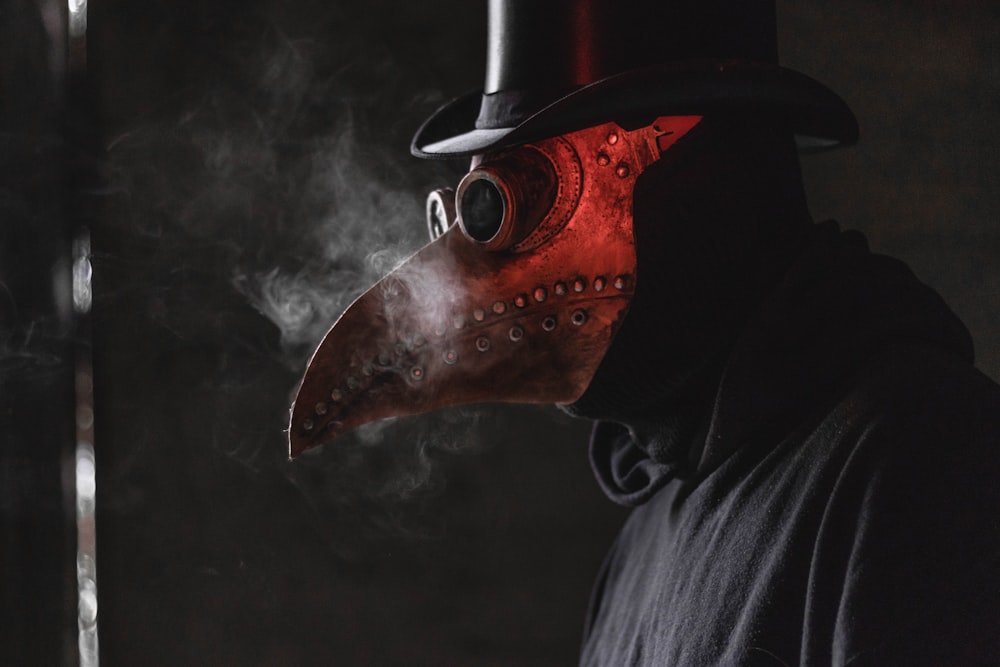 person wears red mask