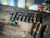 An assortment of fishing accessories like hooks, lines, and reels arranged on a clean surface.