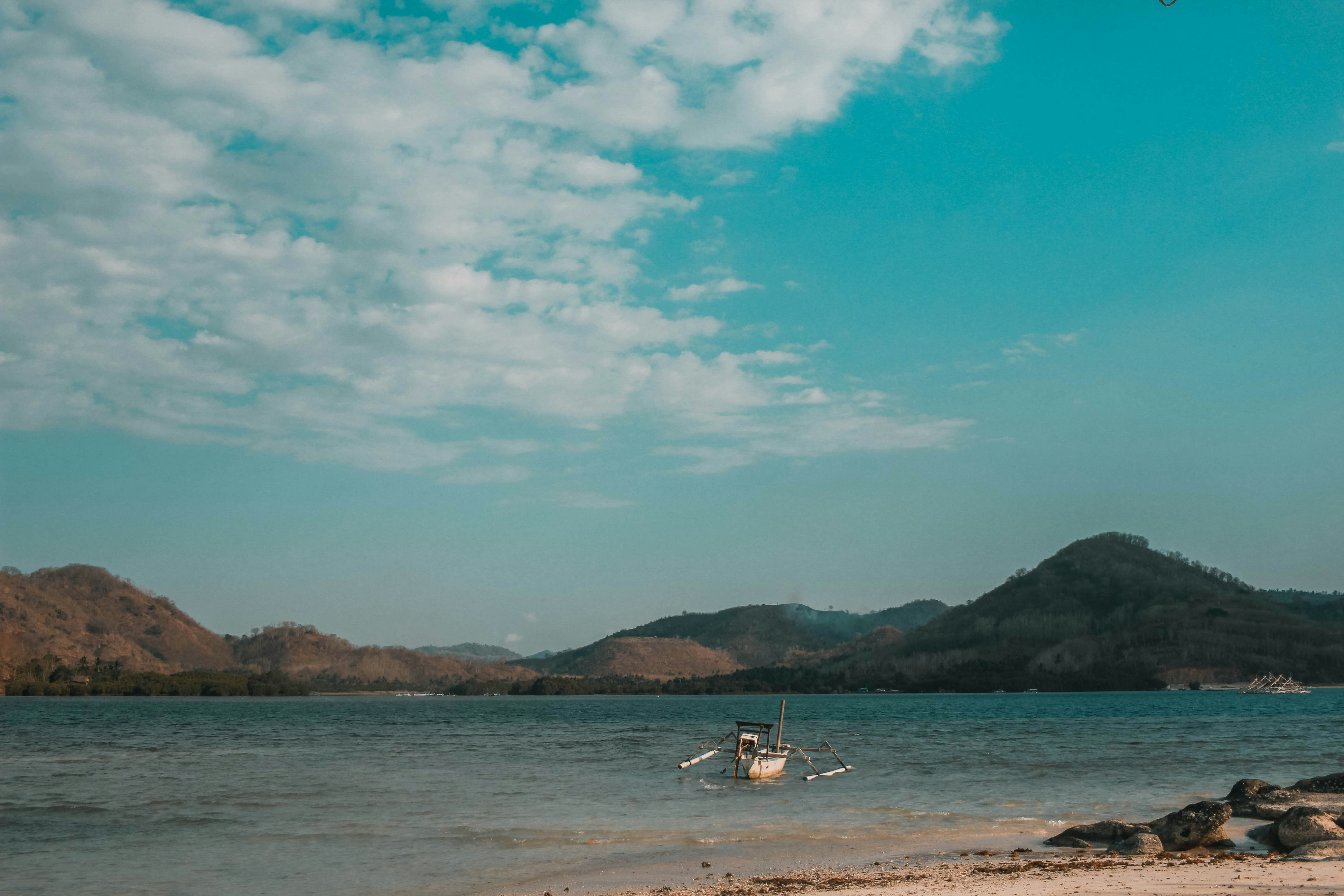white boat on ocean during daytime, Gili Nanggu, Sekotong Barat, West Lombok Regency, West Nusa Tenggara, Indonesia