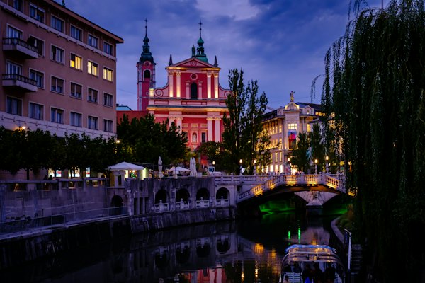 Red and white concrete palace — Ljubljana, Slovenia