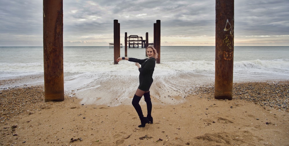 woman on seashore during daytime