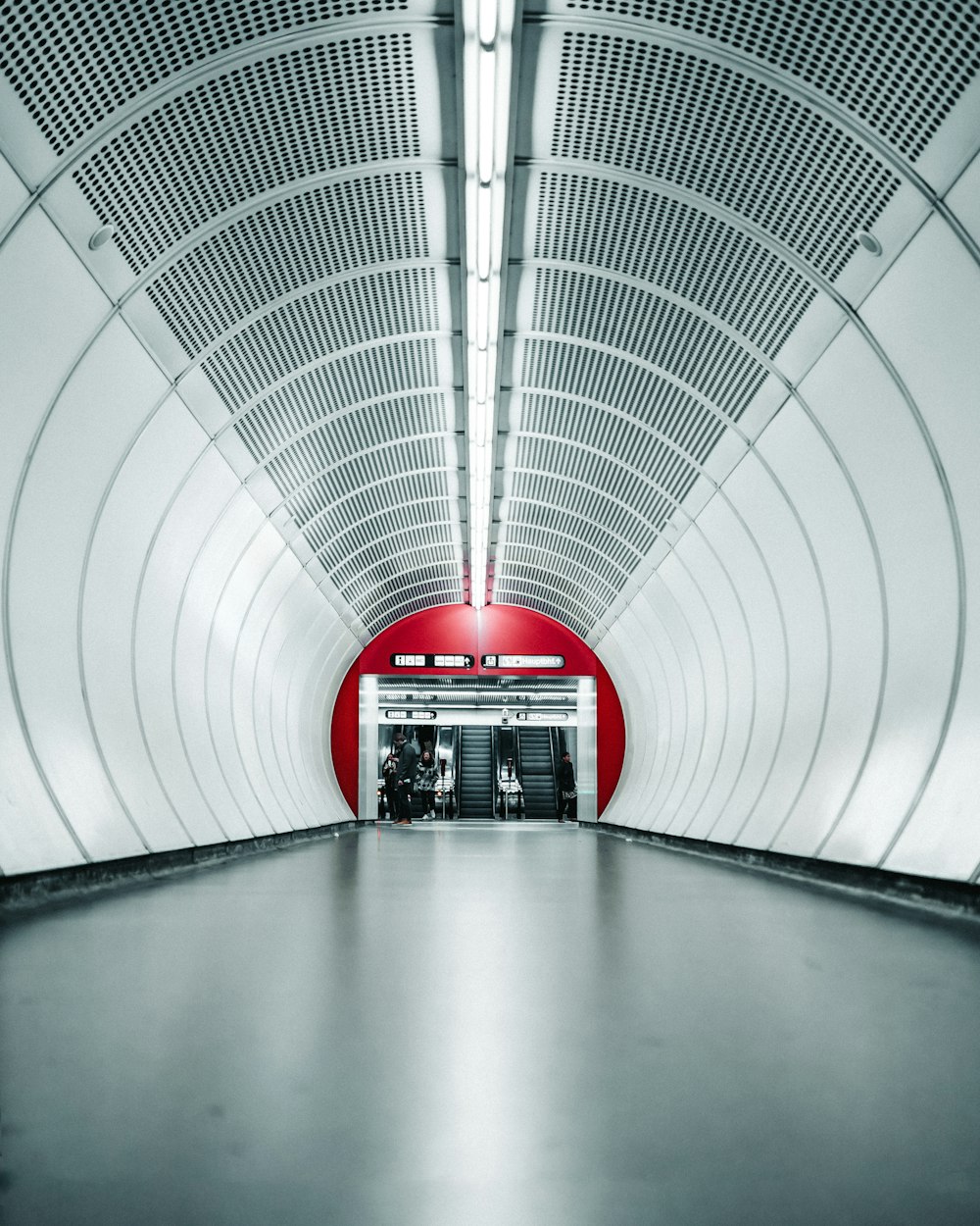 gray and white concrete tunnel