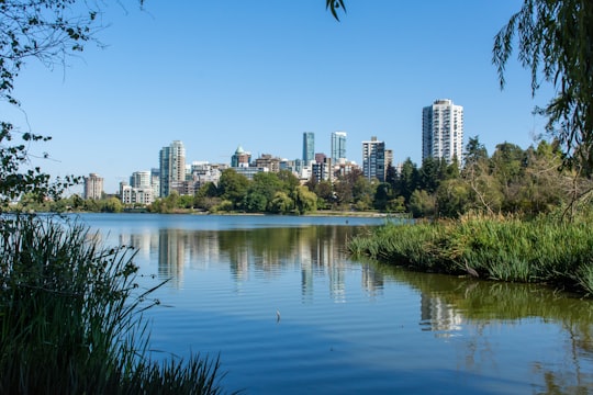 gray buildings in Lost Lagoon Canada