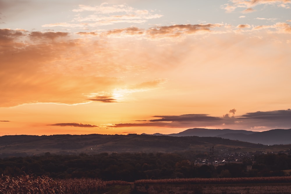 silhouette of mountains during golden hour