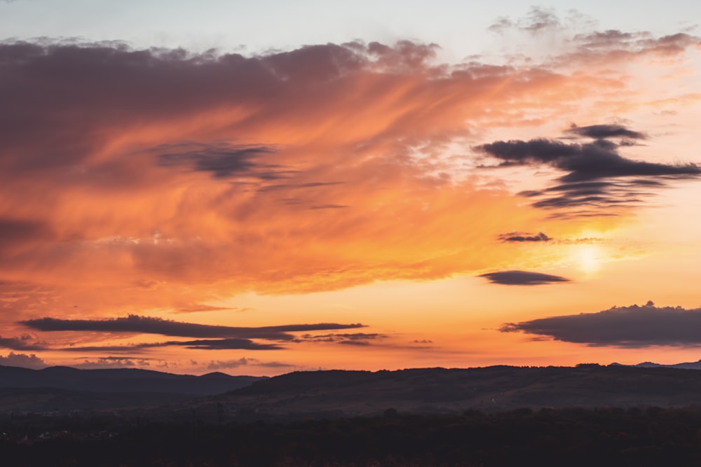 silhouette of land during golden hour