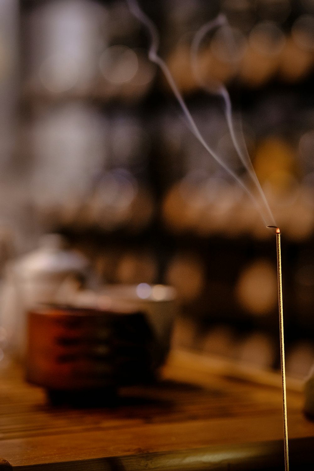 lighted candle in close-up photography