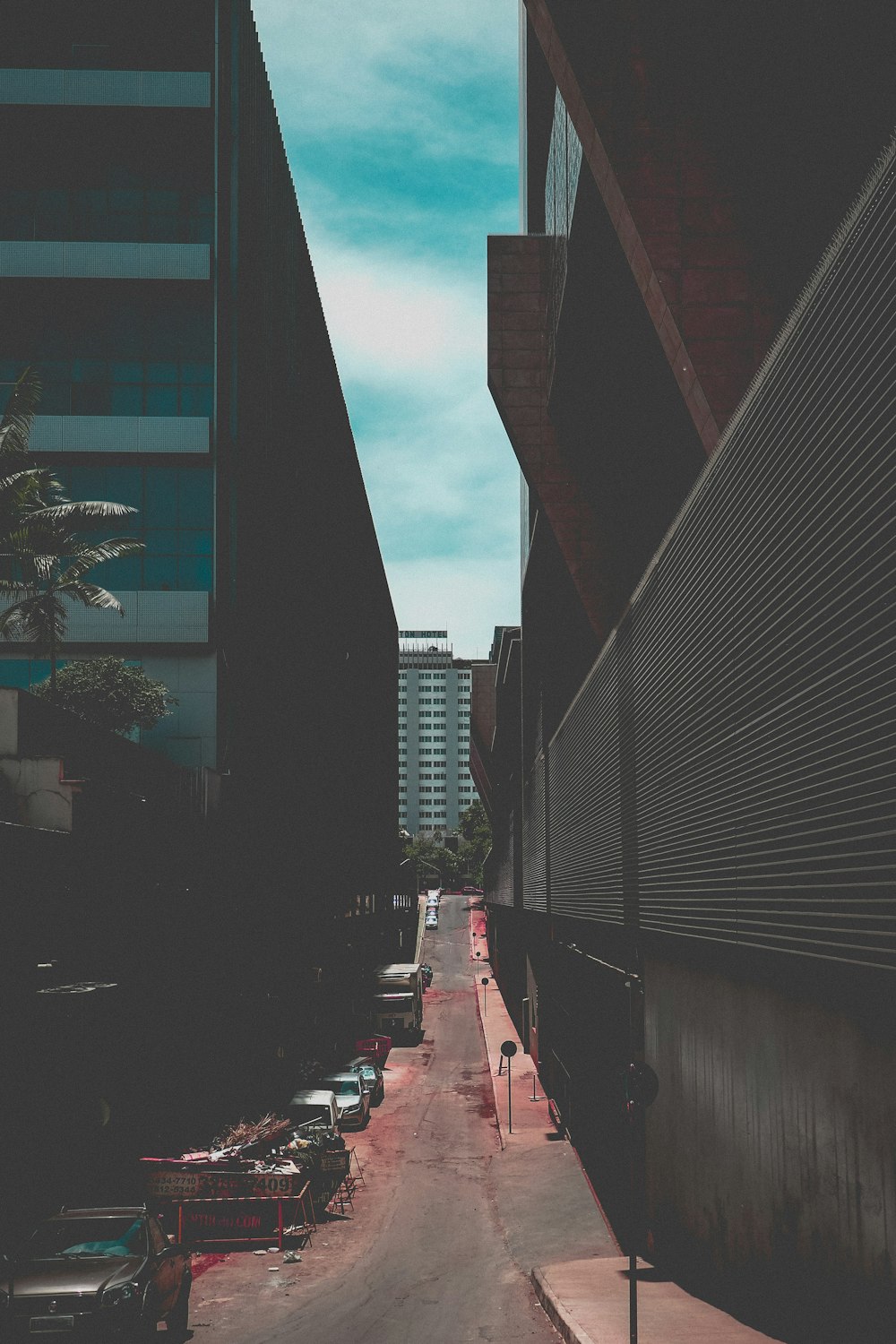 vehicles parked beside building