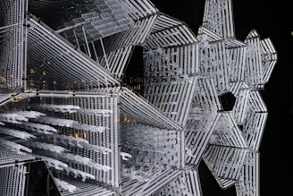 Mystical sacred geometry pattern with shimmering stars and glowing numbers in gold.