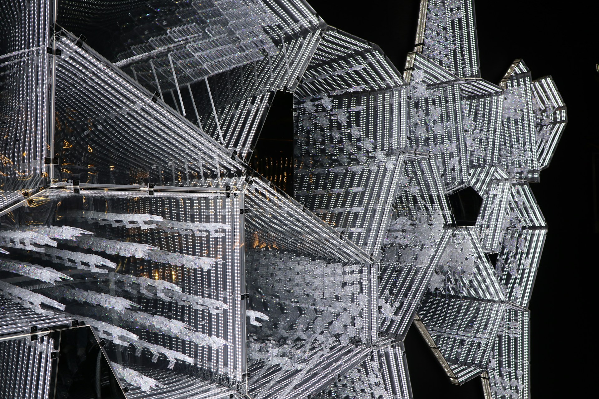 An intricate gemology-inspired design overlaying a sleek naval architecture blueprint, illuminated with sustainable energy motifs.