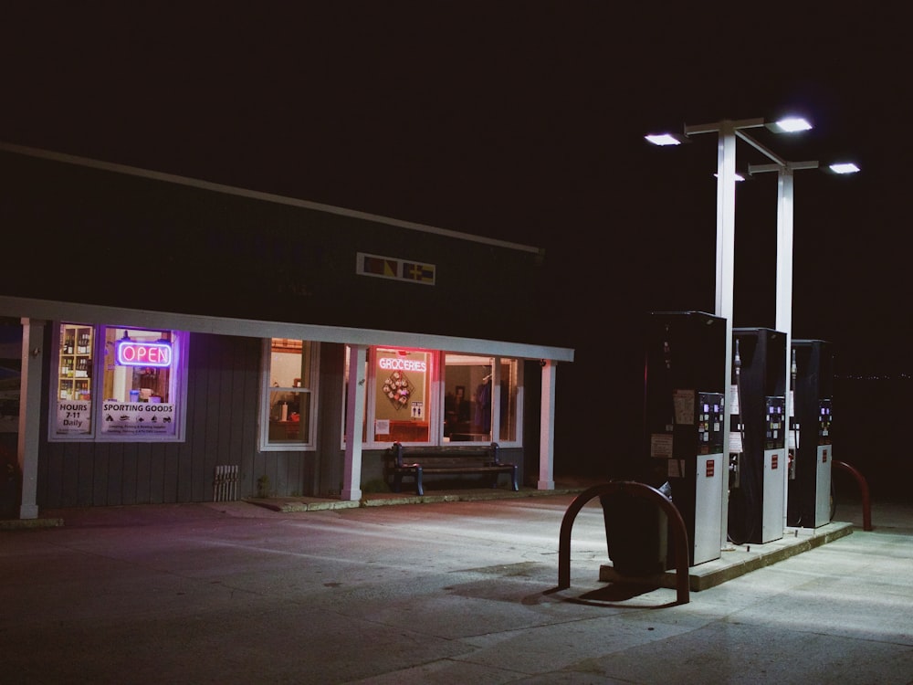 well-lit gas station during night time