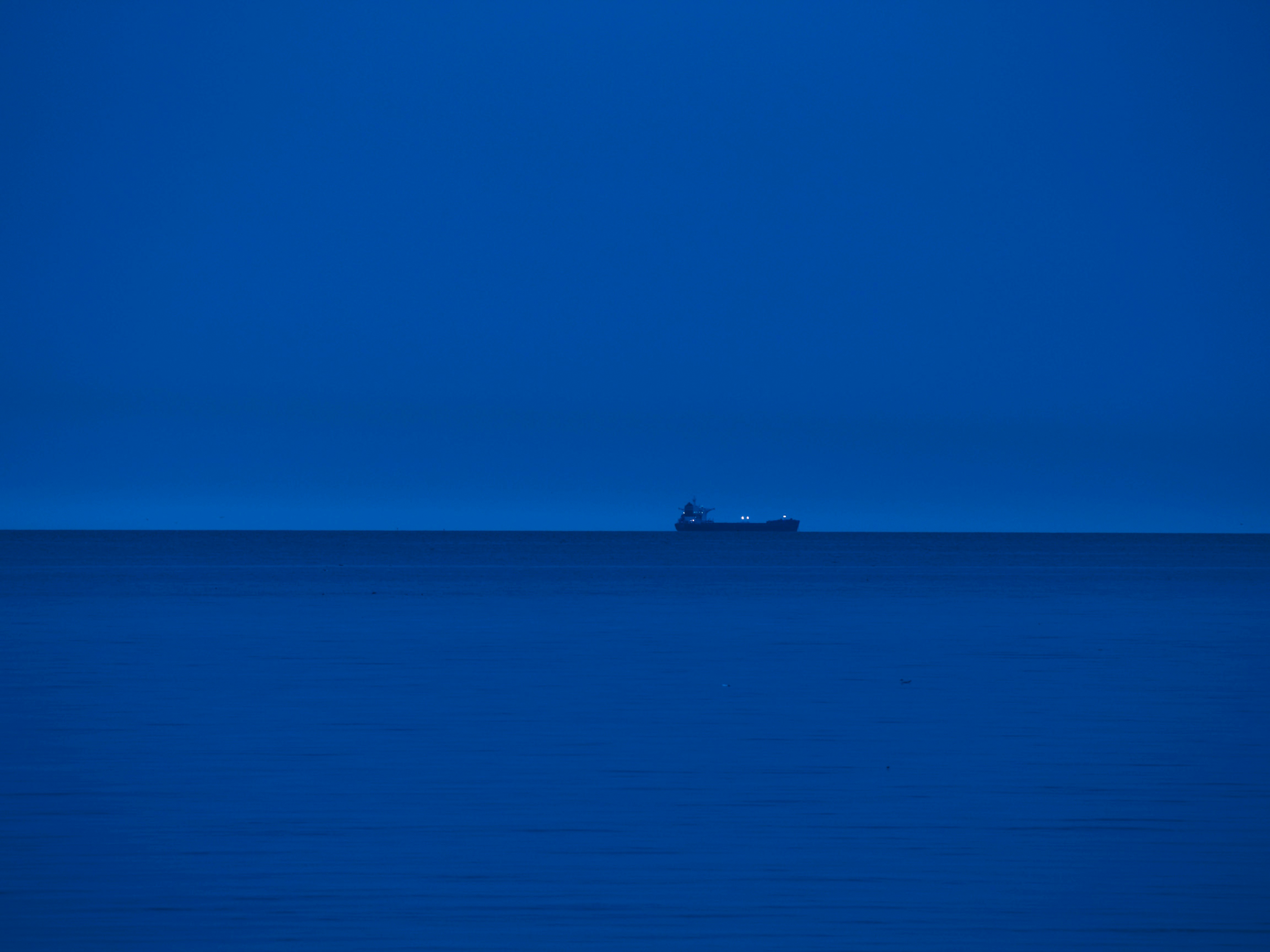 ship sailing on the blue sea