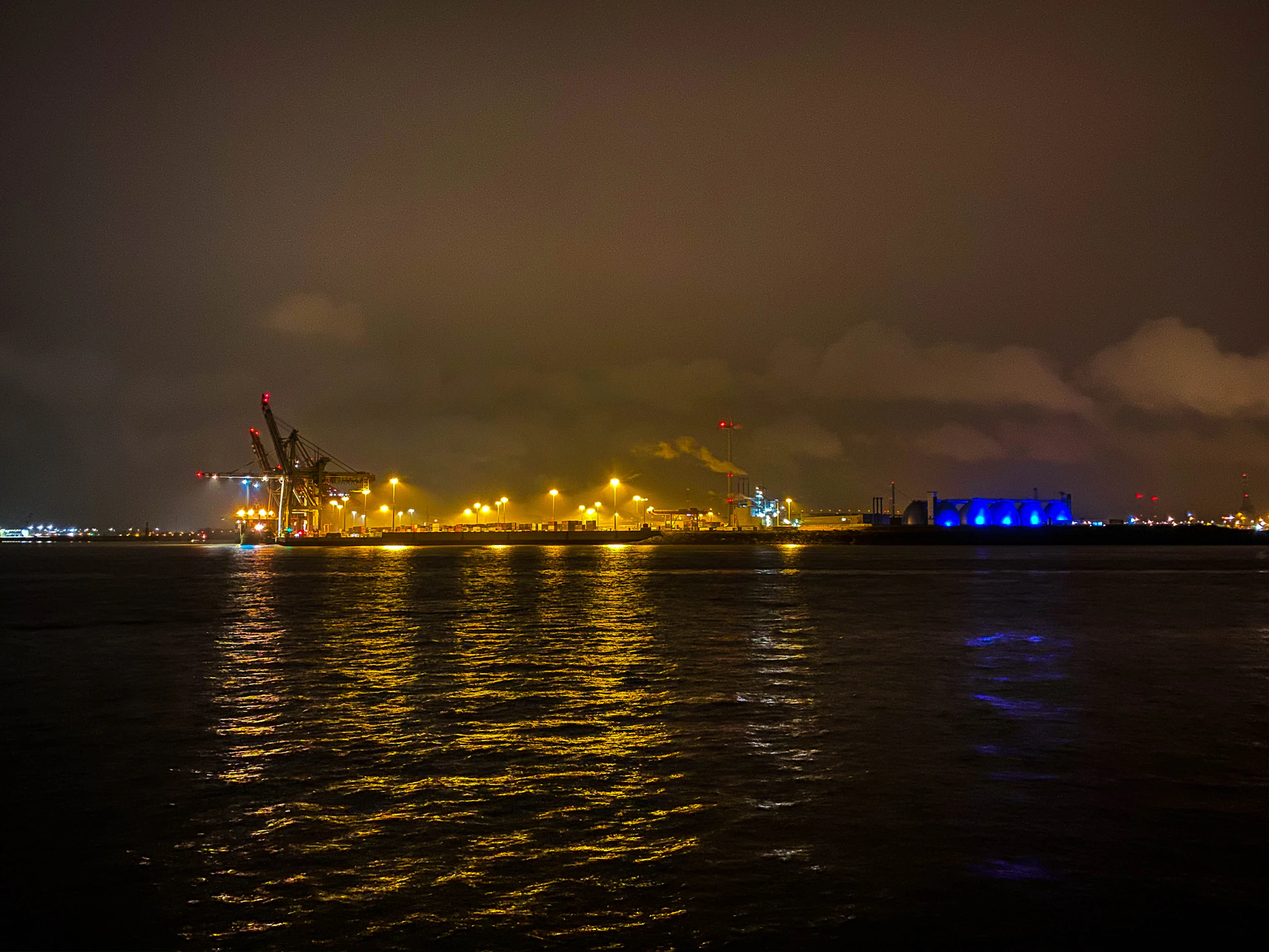 woman wearing yellow long-sleeved dress under white clouds and blue sky during daytime