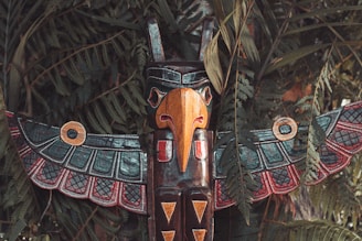 brown and multicolored wooden bird decor