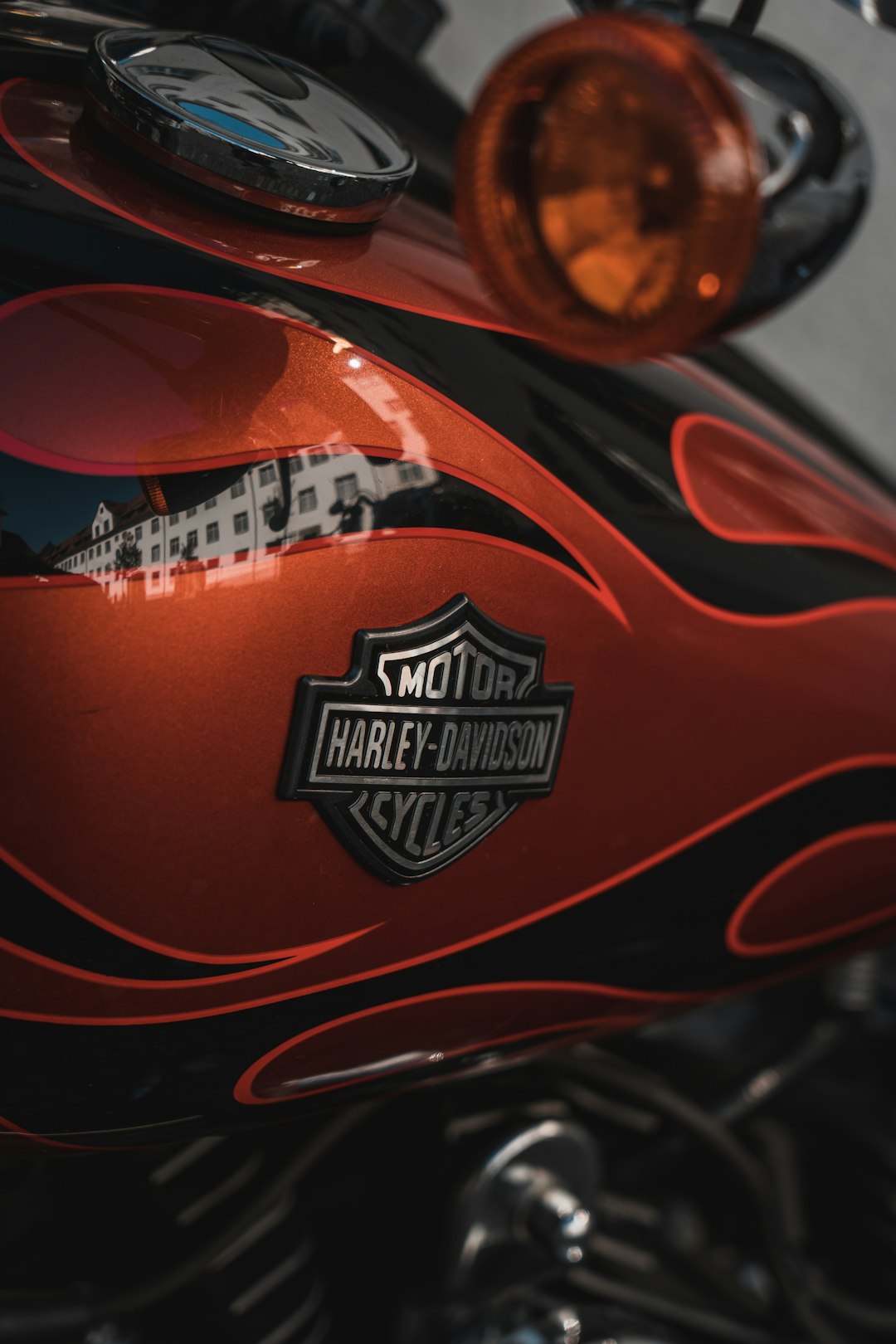 red and black Harley-Davidson motorcycle