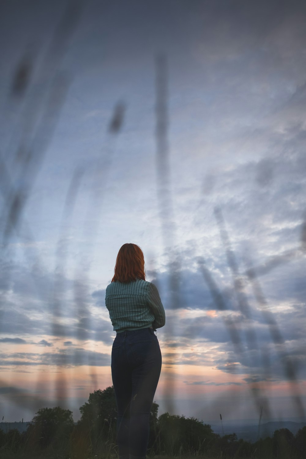 woman standing on grass field