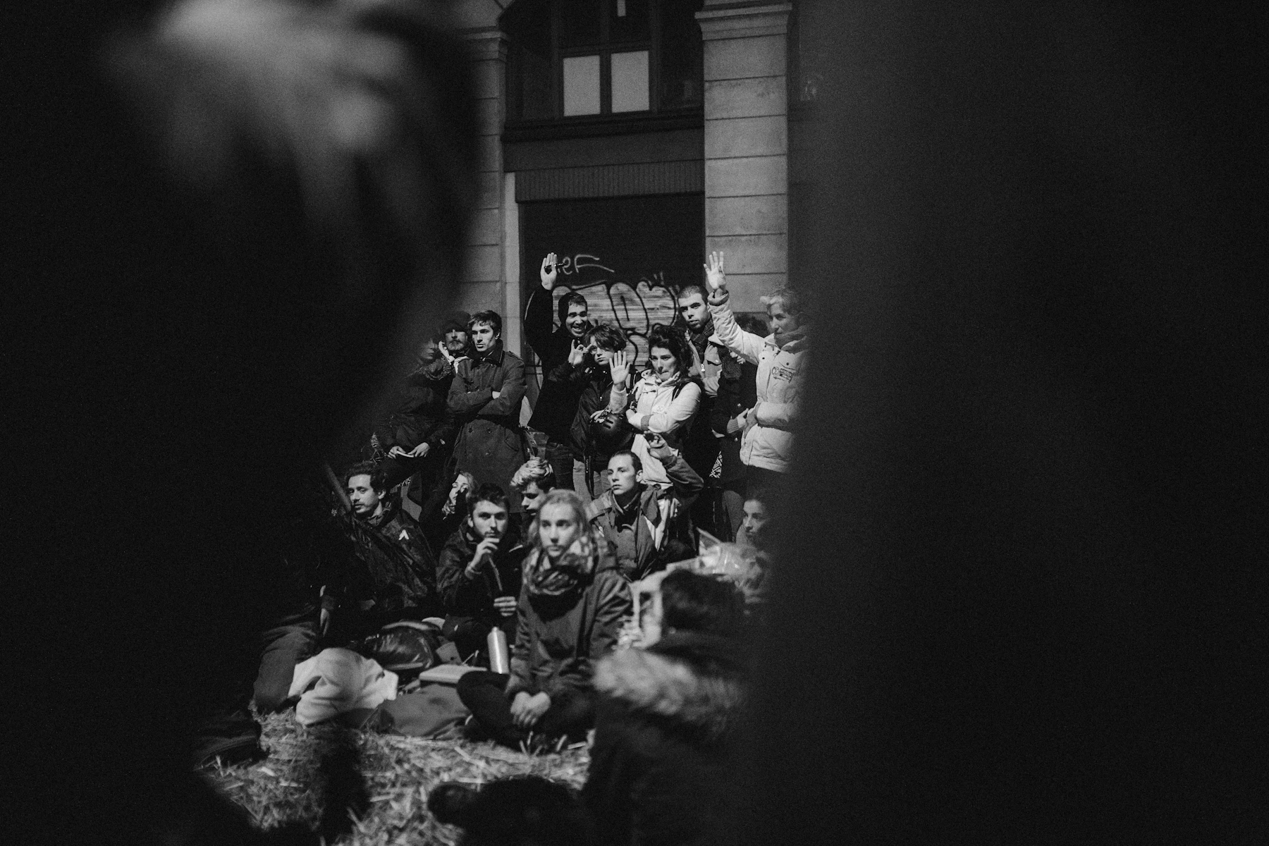 A Black And White Photograph Of A Dense Public Crowd