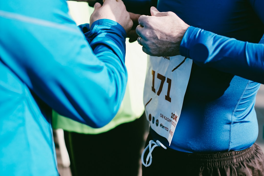 person in blue wetsuit with 171 number