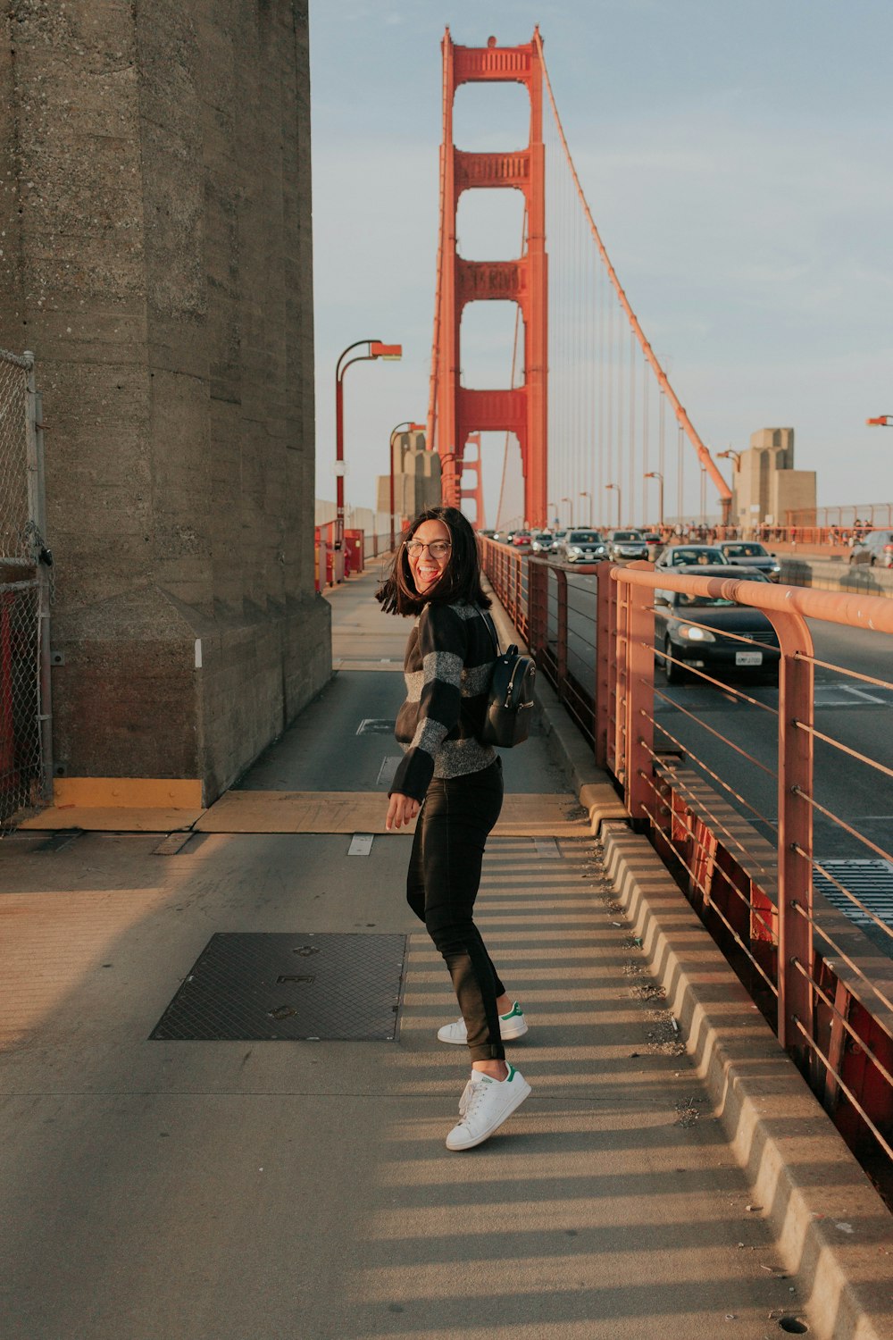 woman standing on brige