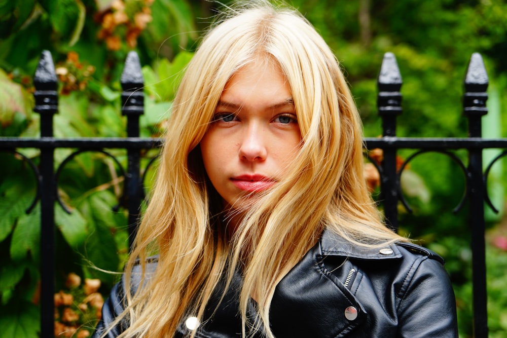 portrait of woman wearing black jacket