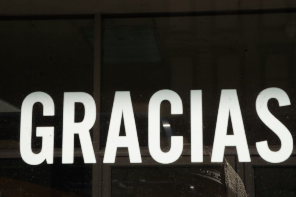 white gracias text overlay